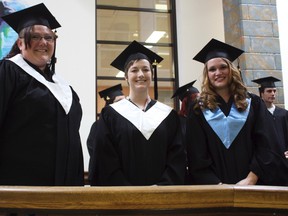 2013 Northern College graduates, from left, Crystal Paiement, Karen Larsen and Cindy Snyder, get ready to receive their certificates and diplomas. Awards and graduation ceremonies are being held throughout the week at the Northern College campuses across the region in Porcupine, Kirkland Lake, Haileybury and Moosonee.