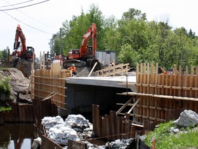 The new bridge on La Vase River at Nipissing Junction is taking shape, as construction crews continued to work at the site Tuesday.