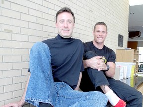 The Chatham-Kent Women's Centre held a launch Tuesday for the fifth-annual Walk a Mile in Her Shoes event, slated for Sept. 8. Shown are Bruce Walker, left, last year's top individual walker, and Josh Blair, of Blairs' Boot Camp, the top large team. PHOTO TAKEN IN CHATHAM ONT. TUESDAY MAY 27, 2013. TREVOR TERFLOTH/ THE CHATHAM DAILY NEWS/ QMI AGENCY