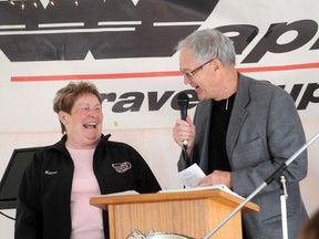Jim Watson congratulates this year’s Wagonmaster Betty Sinclair, at the Stompede Bust Out BBQ, Tuesday.
Aaron Hinks/Daily Herald-Tribune