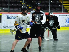 Brockville Balllistic's Cory Robertson battles for position with Kingston Kings captain Logan Rose during Ontario Junior C Lacrosse action at the Memorial Centre on Tuesday night. The Ballistic lost 13-6. (STEVE PETTIBONE The Recorder and Times)
