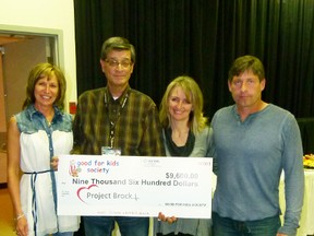 David Andrewsky (second from left) presented a cheque for $9,600 from Good For Kids to Project Brock representatives Liz Campbell (left), Kim and Wayne Ruether to purchase four automatic external defibrillators.