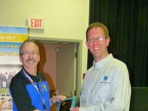 Fairview Rotarian Dennis Radbourne (LEFT) presented Matt Strydhorst (right) with the Rotary Integrity Award, given to a community member (non-Rotarian) who has demonstrated the highest standards in personal and professional ethics.