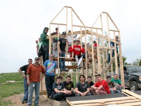Paris District High School construction students help build five cabins for young campers at Tim Hortons Onondaga Farms near St. George, Ontario on Thursday, May 23, 2013. MICHAEL PEELING/The Paris Star/QMI Agency