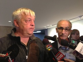 Michael McCrimmon, clinical director of the Canterbury Clinic, and lawyer Robert Rotenberg speak to reporters at Toronto City Hall on Wednesday, May 29, 2013. The clinic is offering to accept the $200,000 Gawker.com has raised to try to buy the Rob Ford crack video if the website ends up donating the money to charity. (DON PEAT/Toronto Sun)