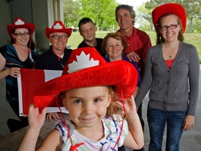 LUKE HENDRY The Intelligencer
Hailey Heffernan, 3, joins Belleville's Canada Day committee at West Zwicks Island Park in Belleville Wednesday. The group needs donations and volunteers for July 1 festivities. From background left: Lauren Landon, Eric Lindenberg, Tim Hunt, and Carol, Dwane and Ashley Barratt. Absent: Rose Mary Rashotte, Bradie Quiring, Greg Landon.