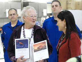 Caryn Ceolin/Daily Herald-Tribune
Glenda Farnden (right) of Shock Trauma Air Rescue Society (STARS) presents the Queen Elizabeth II Hospital Auxiliary Association president Wilma Friesen with two plaques on Tuesday The auxiliary has donated $10,800 to STARS’ Fund-a-Flight program.