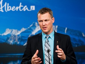 Municipal Affairs minister Doug Griffiths speaks to the media about the Municipal Sustainability Initiative (MSI) at the Alberta Legislature Building in Edmonton on Thursday, February 16, 2012. CODIE MCLACHLAN/EDMONTON SUN QMI AGENCY