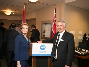 Bill Emmott poses with Ontario Premier Kathleen Wynne, who is also Minister of Agriculture and Food. Lobbying government is a big part of the job for Emmott, who is chairman of the Dairy Farmers of Ontario. (Photo courtesy of Bill Emmott)