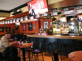 Longtime patron Norman Lapointe has lunch at Longshots Sports Bar and Lounge Wednesday. The bar announced it will shut down in October after seven years; Lapointe has been coming for six of them. Andrew Bates/Today staff