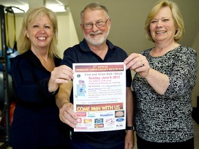 Shirley Anne Ord, Glenn Payne, and Lin Clarke pose with a 2nd Annual Stirling Lions Legacy Run/Walk poster. The run/walk will be held on June 9 at 9 a.m. starting at the Stirling-Rawdon & District Recreation Centre parking lot.