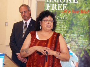 Tracy Whiteye talks about tobacco and its relationship with First Nations people, prior to making a presentation of sacred tobacco, as Chatham-Kent mayor Randy Hope looks on. The Chatham-Kent Leaders' Cabinet issued a call to action to make Chatham-Kent tobacco-free and asked groups and individuals to pledge to going smoke-free, during a presentation at the Wallaceburg Childcare Centre on Thursday, May 30, 2013, Wallaceburg, Ont. (DAVID GOUGH, QMI Agency)