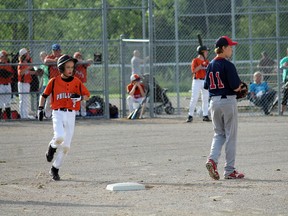 Ethan Beach hit four RBIs for the Paris Phillies against the Brantford Red Sox and drove in four batters on Wednesday, May 22, 2013. The Peewee Tier 2 team was 6-0 as of Monday after beating the Waterloo Tigers. MICHAEL PEELING/The Paris Star/QMI Agency