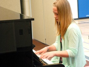 Mikayla Anderson performs a piece on the new piano at St. Mary’s Catholic school in Sexsmith Wednesday.
Caryn Ceolin/DHT