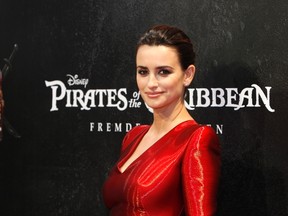 Spanish actress Penelope Cruz poses as she arrives on the red carpet for the premiere of "Pirates of the Caribbean: On Stranger Tides" in 2011.(REUTERS/Michaela Rehle)