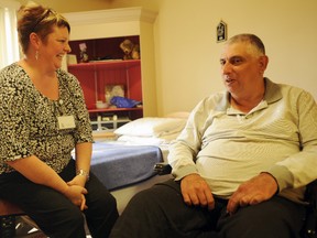 A Marshall Gowland Manor resident chats with resident manager Joyce Heneca at the Sarnia longterm care home in this file photo.