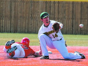 Sherwood Park Dukes infielder Cole Schneider attempts to put the tag on a runner during one of his team’s lone losses this season to the defending national champion Black Dawgs in Okotoks. Photo Courtesy Cheryl Moskaluk