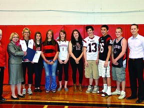 EIPS board member Barb McNeill (far left) stands next to Sherwood Park MLA Cathy Olesen as she presents the $45,000 Community Initiatives Program (CIP) grant to students at Salisbury Composite High School. Photo Supplied