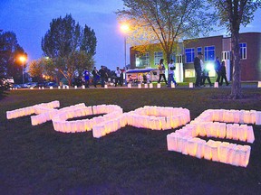 Luminaries are lit to spell out Hope at last year’s Relay for Life at Broadmoor Lake Park. File Photo