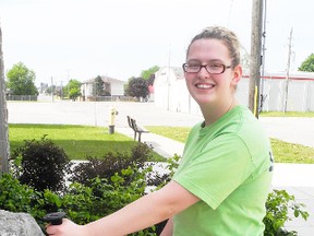 SARAH DOKTOR Simcoe Reformer
Norfolk County instructor guard, Allie Aspden, shows how to use Nordic Poles in front of the Simcoe Recreation Centre on Thursday. Nordic Pole walking is offered on Mondays in June from 9:30 a.m. to 10:30 a.m. outside of the centre as part of recreation month.