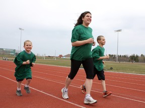 Rhonda Little and her kids Ian Little and Kyle Little (right) go for a practice run as they get ready for the Timmins Golden Trails Festival Committee's seventh-year anniversary event set for August 18.