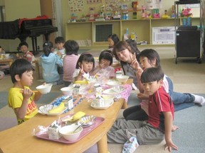 Courtney Wagner with students on a former trip to Shikaoi, Japan. Wagner is returing to Shikaoi for one year to each English as part of the Town of Stony Plain’s teacher exchange program. - Photo Submitted