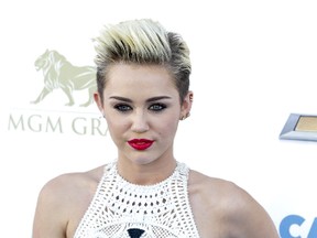 Miley Cyrus mocks pregnancy rumours with pizza baby | Toronto Sun