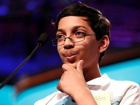 Arvind Mahankali of New York ponders a word on his way to winning the National Spelling Bee at National Harbor in Maryland May 30, 2013. REUTERS/Kevin Lamarque