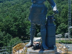 The world's largest cast iron statue, Vulcan, towers over the city from its perch on Red Mountain Vulcan Park and Museum in Birmingham, Alabama in this 2012 Birmingham Convention and Visitors Center photo released to Reuters on May 30, 2013. The statue, depicting the God of Forge, was cast in 1904 for the St. Louis World's Fair, to represent the steel-making town of Birmingham. It won the grand prize at the fair. It is also the second largest statue in the U.S. next to the Statue of Liberty. REUTERS/Birmingham Convention and Visitors Center/Handout via Reuters