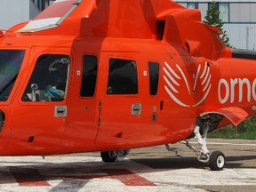 ORNGE Sikorsky S76 helicopter similar to the one that crashed at Moosonee early Friday, in a Timmins Times file photo, at the Timmins and District Hospital.