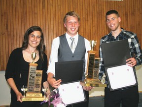From left, Jodi Melillo, David Simpkin and Davin Iverson hold up their Athlete of the Year awards. Melillo won Female Athlete of the Year while Simpkin and Iverson split the Male Athlete of the Year at the Beaver Brae Athletic Banquet on Thursday, May 30, 2013. 

GRACE PROTOPAPAS/KENORA DAILY MINER AND NEWS/QMI AGENCY