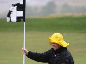 Anne Kromm, golf coach and teacher at Cochrane High, had the right idea for headwear at the Genesis Links to Learning Golf Tournament, May 24.