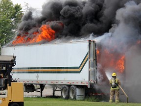 At approximately 1 p.m. police and fire officials were called to a parking lot on the corner of Richmond Street and Bloomfield Road where a trailer was fully engulfed in flames. Police said the fire was possibly caused by an electrical issue within the trailer. Damage is estimated at $10,000. KIRK DICKINSON/FOR CHATHAM DAILY NEWS/ QMI AGENCY
