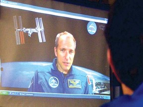 Canadian astronaut David Saint-Jacques speaks from Houston, Texas, to students at Stratford Central Secondary School by Skype on Friday. (SCOTT WISHART, The Beacon Herald)