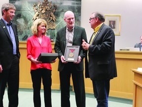 It was a heartfelt ceremony for Leduc Alliance Church’s Pastor Grant McDowell and his wife Donna (centre) who were recognized by city council with a special ceremony. STEPHANIE DUBOIS/QMI AGENCY