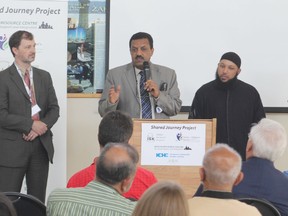 Mohammed Baobaid, executive director of the  Muslim Resource Centre for Social Support an Integration, speaks at Friday's announcement of a new program to address child and domestic abuse. Baobaid was joined at the announcement by Steve Woodman of Family and Children's Services of Frontenac, Lennox and Addington, left, and Sikander Hashmi, Imam of the Islamic Society of Kingston.
Elliot Ferguson The Whig-Standard