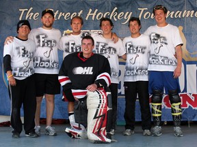 From left to right, Jeff Drexler, Jeff Paulley, Brent Sauve, Jason Teschke, Josh Teschke, Steve Farlow and goaltender Sean Parker of the Fish Hookers at the Play On 4-on-4 hockey tournament in London, Ont. last weekend. (Submitted photo)