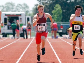 Cole Norton, centre, of Picton’s Prince Edward Collegiate Institute, wins the junior boys 100-metre final in a field including Brockville Thousand Islands’ Liam Smith, left, and La Salle Secondary’s Reed Kekewich, right, at the East Regional track and field championships at Mary Ann Sills Park in Belleville on Friday. Kekewich finished fifth. (QMI Agency)