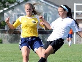Chatham-Kent's Hunter Medd, left, and Belle River's Jazmin Martin battle for the ball during the Golden Hawks' 3-2 loss in the SWOSSAA 'AAA' girls soccer final Wednesday at the Chatham-Kent Community Athletic Complex. The Hawks bounced back from the loss to beat LaSalle Villanova 2-1 in a challenge game Friday. (MARK MALONE/The Daily News)
