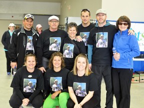 Members of 'Dave and Dad's Darlings' pose prior to walking in the Central Plains Challenge Walk on Island Park, Saturday. David Guy was diagnosed with cancer in April of 2012; he walked with his wife Kim and their daughters and sons-in-law after receiving a chemotherapy treatment the previous day. (ROBIN DUDGEON/PORTAGE DAILY GRAPHIC/QMI AGENCY)