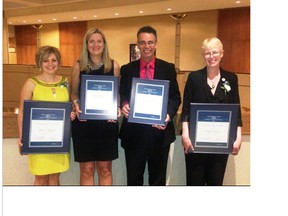 L-R Teacher of Excellence Award winner Dianne Rizzato, Ecole Dickinsfield School Vice Principal Jodine Wells and Principal Paul Smith and Teacher of Excellence Award winner Kitty Cochrane.