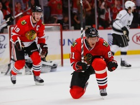 Chicago Blackhawks' Marian Hossa celebrates his second period goal against the Los Angeles Kings as teammate Jonathan Toews looks on during Game 1 of their NHL Western Conference final hockey playoff game in Chicago, Illinois, June 1, 2013.  (REUTERS)
