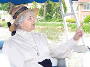 Cruising down the Avon River on the Juliet III, Carole Huband, of the Stratford Perth County branch of the Architectural Conservancy of Ontario, explains what life along the river was like up to 1913 and who lived in some of the houses that back onto the water. (LAURA CUDWORTH, The Beacon Herald)