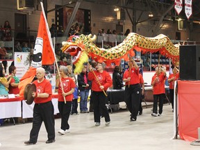 Members of the Timmins Taoist Tai Chi organization held a traditional Chinese dragon aloft during the parade of nations on Sunday at the McIntyre Arena. The parade kicked off the multicultural festival, which showcases what it means to be a member of the diverse Timmins community.