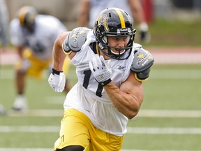 Samuel Giguère gets in a workout  Tiger-Cats training camp at McMaster University in Hamilton yesterday. The Ticats are looking to build on a brutal 2012 season. (Ernest Doroszuk/Toronto Sun)