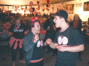 GRACE PROTOPAPAS/Daily Miner and News 
Two people dance to the music of Big Boogaloo at the fourth annual Boobie Nights under the Whitecap Pavilion on Saturday, June 1. The event was another big success completely selling out and welcoming hundreds of people decked out in pink.
GRACE PROTOPAPAS/Daily Miner and News