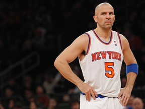 New York Knicks point guard Jason Kidd looks on against the Milwaukee Bucks in the second quarter of their NBA basketball game at Madison Square Garden in New York, in this February 1, 2013, file photo.  All-Star point guard Jason Kidd is retiring after 19 seasons in the National Basketball Association, the New York Knicks player said on June 3, 2013. (REUTERS/Adam Hunger/Files)