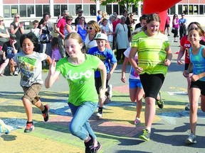 As parents and grandparents applauded and cheered on last week, students at Gananoque’s Linklater Elementary School ran their last kilometre of the season.     Wayne Lowrie - Gananoque Reporter