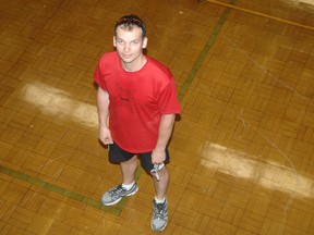 Jeremy Yates, althetic director at HPSS, stands on the 50-year-old gym floor he hopes will be replaced by summer 2015. The gym floor has caused repeat injuries in students because it has no cushioning. A walk-a-thon being held today (Tuesday) kicks off the $200,000 fundraising campaign.  
TARA BOWIE / SENTINEL-REVIEW / QMI AGENCY