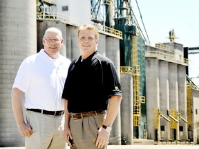 Wes Thompson, president and chief executive officer of Thompsons Ltd., left, took new owners Bill Krueger, chief executive officer of Lansing Trade Group, right, and Mike Anderson, chairman and chief executive officer of The Andersons, Inc., not pictured, for a tour of the many facilities owned by Thompsons in the Chatham-Kent area. The Andersons and Lansing Trade Group will own a 50% share each in the company.  Photo taken Blenheim, On., Monday June 03, 2013. DIANA MARTIN/ THE CHATHAM DAILY NEWS/ QMI AGENCY